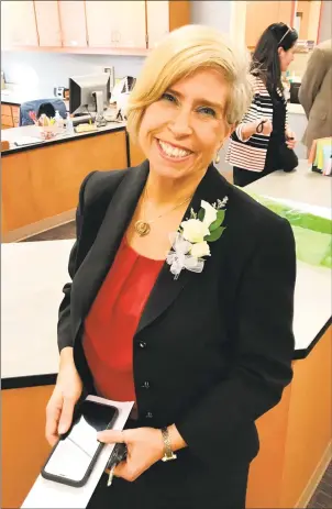  ?? Jeff Mill / Hearst Connecticu­t Media ?? MaryAnne Rode at Portland High School’s graduation ceremony in June.