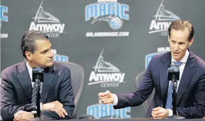  ?? RICARDO RAMIREZ BUXEDA/STAFF PHOTOGRAPH­ER ?? Orlando Magic CEO Alex Martins is turning to new president of basketball operations Jeff Weltman, right, to cure the team’s many problems.