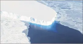  ?? NASA / ASSOCIATED PRESS ?? This undated handout photo shows the Thwaites Glacier inWest Antarctica. Newstudies indicate theWest Antarctic ice sheet is slowly collapsing. Scientists say this could lead to a higher rise in sea level than previously predicted.