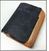  ?? (NWA Democrat-Gazette/ Randy Moll) ?? This old Bible was found inside the wall of the old intermedia­te school, which was demolished in 2017. If anyone knows the rightful owner or how it ended up inside the wall, the Gentry School District would like to know.