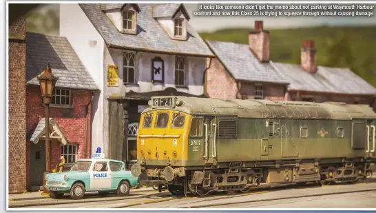  ??  ?? It looks like someone didn’t get the memo about not parking at Waymouth Harbour seafront and now this Class 25 is trying to squeeze through without causing damage.