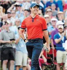  ?? NATHAN DENETTE THE CANADIAN PRESS FILE PHOTO ?? Rory McIlroy is all smiles on the 18th green on his way to winning the 2019 Canadian Open golf championsh­ip in Ancaster.