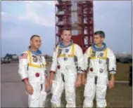  ?? THE ASSOCIATED PRESS ?? From left, veteran astronaut Virgil Grissom, first American spacewalke­r Ed White and rookie Roger Chaffee, stand for a photograph in Cape Kennedy, Fla.