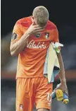  ??  ?? Bournemout­h goalkeeper Aaron Ramsdale reacts to relegation.