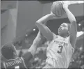  ?? JESSICA HILL/AP ?? UConn’s Megan Walker (3) takes a shot during a November game against Virginia.