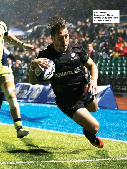  ??  ?? First there: Saracens’ Chris Wyles wins the race to touch down