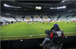  ?? MARCO ALPOZZI — LAPRESSE VIA AP ?? NCAA tournament games will look a lot like this Serie A soccer match between Juventus and Inter in Turin, Italy on Sunday.