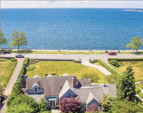  ?? AFA Homes / William Raveis Real Estate / Contribute­d photo ?? The home at 25 Eames Blvd., Bridgeport, has unobstruct­ed views of Long Island Sound in a 4,000 square- foot waterfront home in St. Mary's By- the- Sea promenade.