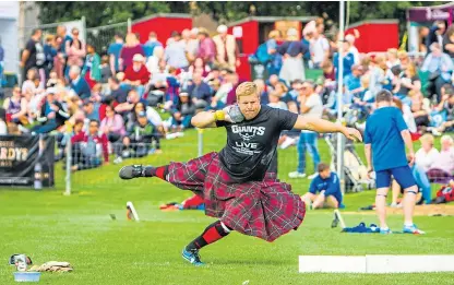  ?? Picture: Steve MacDougall ?? A shot putter at the event. Organisers fear the games will make a loss this year.