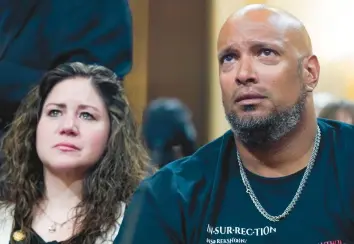  ?? ?? U.S. Capitol Police Sgt. Harry Dunn, right, and Sandra Garza, longtime partner of fallen Capitol Police Officer Brian Sicknick, watch a video of the Jan. 6, 2021, attack on the Capitol during a hearing Thursday night in Washington.