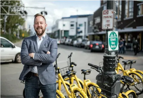  ??  ?? Chris Taylor in downtown Seattle. He leads Ofo’s business in the U.S., where the company now has 40,000 bikes.