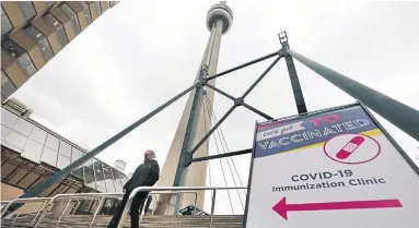  ?? RICHARD LAUTENS TORONTO STAR FILE PHOTO ?? Getting your second vaccinatio­n is cause to celebrate, Heather Mallick writes, but not cause to mob clinics and be rude.