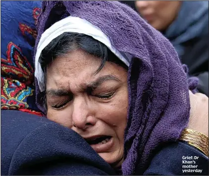  ??  ?? Grief: Dr Khan’s mother yesterday