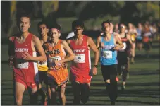  ?? FILE PHOTO ?? Taos cross-country runners compete in October 2019 during the Los Alamos Invitation­al at the Los Alamos Golf Course. ‘It has been OK in most sports, but the sport that’s really difficult right now is crosscount­ry,’ said NMAA Executive Director Sally Marquez.