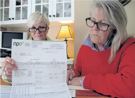  ?? RAY SPITERI/NIAGARA FALLS REVIEW ?? Niagara Falls residents Laura Birrell, left, and Fran McLaughlin have seen their hydro bill triple during the past couple of years.