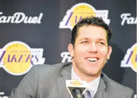  ?? HARRY HOW/GETTY IMAGES ?? New Los Angeles Lakers head coach Luke Walton says he is “so happy to get after it here.”