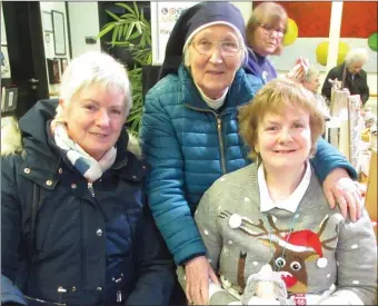  ??  ?? Mary Kate Dolan, Ann Brennan and Sr John at the Christmas market in the Nazareth Cafe.