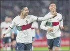  ?? Efe ?? Dalot (aquí junto a CR7) logró un doblete