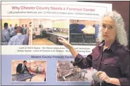  ?? PHOTO COURTESY OF CHESTER COUNTY CORONER’S OFFICE ?? Chester County Coroner Dr. Christina VandePol displays a photograph­ic poster outlining the need for a new morgue facility.