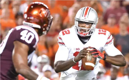  ?? GETTY IMAGES ?? Former Ohio State quarterbac­k Cardale Jones downplayed the importance of education on Twitter in 2012 but later admitted he was wrong.