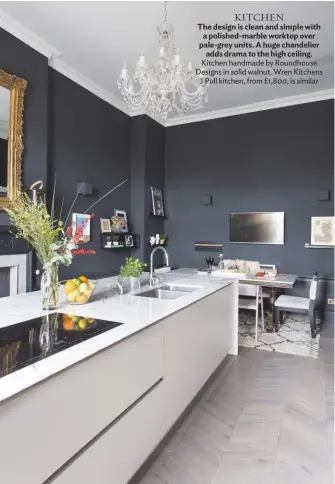  ??  ?? KITCHEN
The design is clean and simple with a polished-marble worktop over pale-grey units. A huge chandelier adds drama to the high ceiling. Kitchen handmade by Roundhouse Designs in solid walnut. Wren Kitchens J Pull kitchen, from £1,800, is similar