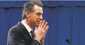  ?? Rich Pedroncell­i / Associated Press ?? Gov. Gavin Newsom’s budget proposal is about to encounter a grim reality.
