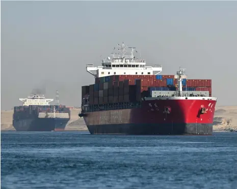  ?? Getty Images ?? Vessels cross the Suez Canal near Ismailia. The Egyptian government earns a seventh of its revenue from the canal