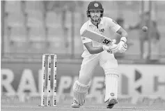  ??  ?? Sri Lanka batsman and team captain Dinesh Chandimal plays a shot during the third day of the third Test cricket match between India and Sri Lanka at the Feroz Shah Kotla Cricket Stadium in New Delhi. — AFP photo