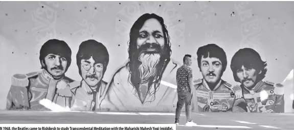  ?? ?? In 1968, the Beatles came to Rishikesh to study Transcende­ntal Meditation with the Maharishi Mahesh Yogi (middle).
