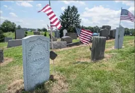  ?? Emily Matthews/Post-Gazette ?? The new headstone of Samuel Giffenney, who served in the United Stated Colored Infantry, can be seen in the Soldiers Circle, a section of Homestead Cemetery that contains the graves of soldiers from the Civil War and Spanish-American War.