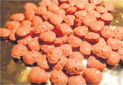  ??  ?? ●●Ecstasy pills come in all different shapes and colours