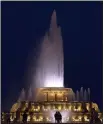  ?? AP/G-JUN YAM ?? The Buckingham Fountain’s final display at night includes a light-andmusic crescendo as water shoots 150 feet into the air.