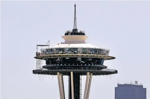  ?? — THE ASSOCIATED PRESS ?? Seattle’s .right family built — and owns — the Space Needle, which underwent the biggest renovation in its history.