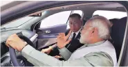  ?? PHOTO: OFFICIAL TWITTER ACCOUNT OF THE EMBASSY OF INDIA IN SEOUL ?? Prime Minister Narendra Modi in Hyundai’s fuel cell e-SUV NEXO along with Hyundai Motor Company Vice-Chairman Euisun Chung in New Delhi on Tuesday