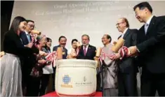  ??  ?? From left: Chrysies, Robin, Madam Low, Esther, Vincent Tan, Tunku Tun Aminah, Sultan Ibrahim, Kadokawa, Sharp and Yamada during the sake barrel breaking ceremony to signify the official launch of the Four Seasons Hotel Kyoto in Japan yesterday.