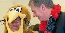  ?? PHOTO: ROSS GIBLIN/FAIRFAX NZ ?? Prime Minister Bill English and Mimisa Omeri at Windley School, Porirua.