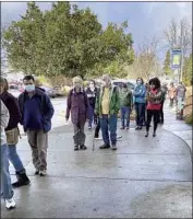  ?? Cici Winiger ?? PEOPLE line up outside Adventist Health Ukiah Valley Medical Center on Monday for vaccine shots.