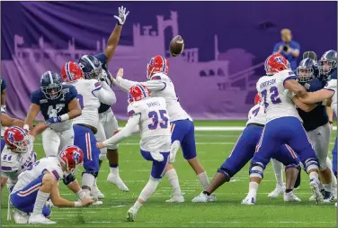  ?? Associated Press ?? Field goal: Louisiana Tech place kicker Jacob Barnes (35) kicks a field goal against Georgia Southern during the first half of the New Orleans Bowl in New Orleans Wednesday. The Eagles beat the Bulldogs 38-3.