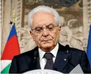  ?? AP ?? President Sergio Mattarell, left, has refused to approve premier-designate Giuseppe Conte’s choice of an economy minister.
