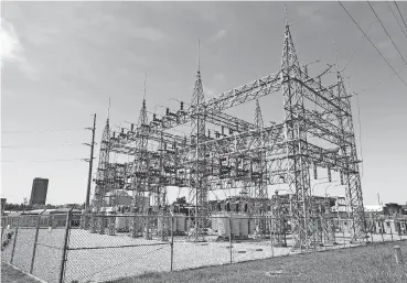  ?? [THE OKLAHOMAN ARCHIVES] ?? A substation is shown in northeast Oklahoma City. Oklahoma Gas and Electric Co. is using an electrifie­d barrier around some substation­s inside its service area in Arkansas to see how successful it might be in keeping varmints out of substation gear.