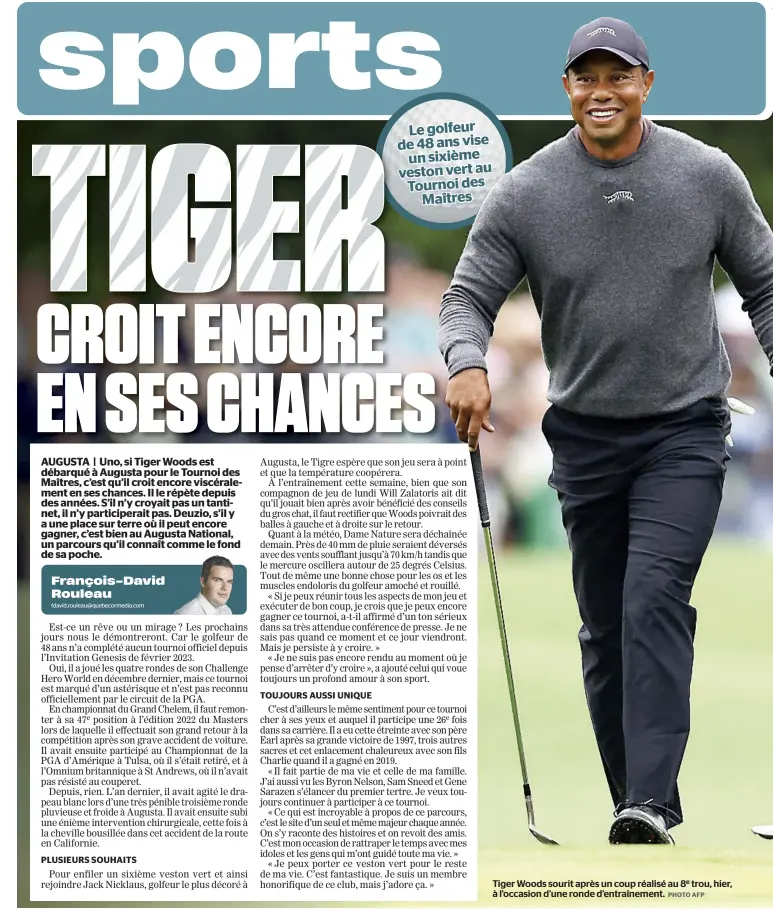  ?? PHOTO AFP ?? Tiger Woods sourit après un coup réalisé au 8e trou, hier, à l’occasion d’une ronde d’entraîneme­nt.