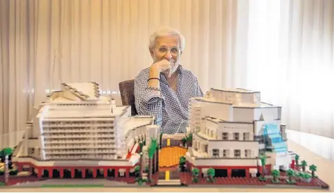  ?? PATRICK FARRELL/MIAMI HERALD ?? Stu Blumberg, photograph­ed at his home Nov. 7, spent five months assembling the Adrienne Arsht Center for the Performing Arts out of 6,630 Lego bricks.