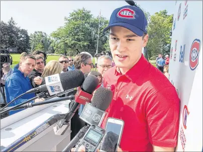  ?? CP PHOTO ?? Montreal Canadiens forward Jonathan Drouin speaks to the media before the team’s annual charity golf tournament on Monday in Laval, Que.