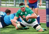  ??  ?? GREEN GIANT: CJ Stander scores one of his three tries at the Stadio Olimpico yesterday