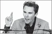  ?? AP/ANDREW HARNIK ?? “If you listen real close, you can hear the people in power shaking,” David Hogg, a survivor of the shooting in Parkland, Fla., said at the Washington rally.