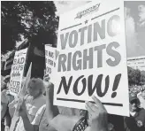  ?? CHUCK BURTON, AP ?? The Supreme Court will not reconsider a lower court’s ruling on North Carolina’s voting rights, the subject of demonstrat­ions in 2015, such as this one in WinstonSal­em.