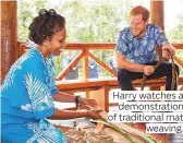  ?? Photos by AP and Reuters ?? Harry watches a demonstrat­ion of traditiona­l mat weaving.