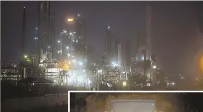  ?? AP PHOTOS ?? WATER WORLD: This Valero oil refinery, above, is among those that was disabled after Hurricane Harvey made landfall Friday in Corpus Christi, Texas. At right, a motorist tries to navigate a Jeep yesterday in Houston.