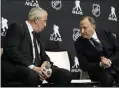  ?? FRANK GUNN — THE ASSOCIATED PRESS ?? NHL Commission­er Gary Bettman, right, speaks with IIHF president Luc Tardif during a news conference in Toronto on Friday to announce NHL players are returning to the Olympics for the first time in more than a decade.