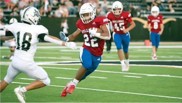  ?? Courtesy Photo ?? Coahoma Bulldog Brysen Kerby, No. 22, carries the ball during the 2021 Howard County Bowl against the Forsan Buffaloes on Aug. 27, 2021, in Big Spring.